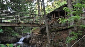 Escape From It All At A Cabin With Its Own Private Waterfall In Minnesota