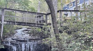 A Hidden Paradise In Alabama, This Whimsical Cottage Has Its Very Own Private Waterfall